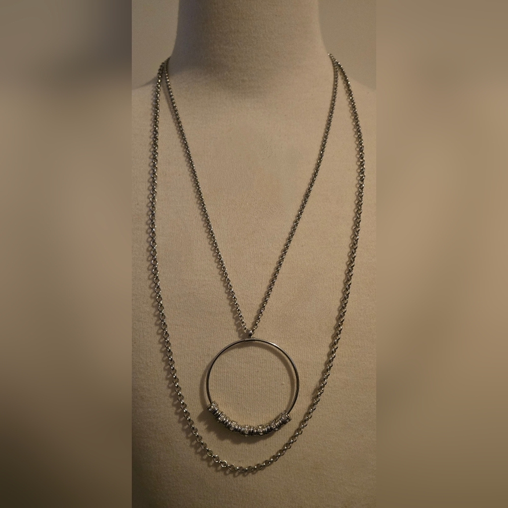 Jessica Simpson Silver Necklace; 2 Chains, Circular Pendant w/25 bands and gems